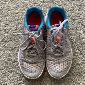 Gray and Blue Nike shoes